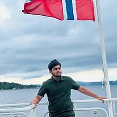 Saiful Islam enjoying a boat trip on the water